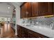 Elegant kitchen features marble countertops, subway tile backsplash, and custom cabinetry at 1104 Covered Bridge Trl, Chapel Hill, NC 27517