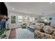 Cozy living room with fireplace, natural light, and comfortable seating at 1104 Covered Bridge Trl, Chapel Hill, NC 27517