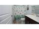 Bathroom featuring a vanity with a sink, toilet, and a shower curtain with a sea turtle pattern at 1209 Redwood Valley Ln, Knightdale, NC 27545
