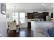 Open concept living room and dining room with hardwood floors and natural light at 1209 Redwood Valley Ln, Knightdale, NC 27545