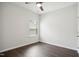 Neutral bedroom featuring hardwood floors and one window at 1316 London Meadow Way, Fuquay Varina, NC 27526