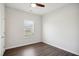 Neutral bedroom featuring hardwood floors and one window at 1316 London Meadow Way, Fuquay Varina, NC 27526