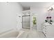 Bright bathroom with soaking tub, separate shower and vanity with double sinks at 1412 Amberton Ct, Raleigh, NC 27615