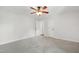 Bedroom featuring neutral carpet, a ceiling fan, and entry to closet at 1412 Amberton Ct, Raleigh, NC 27615