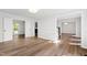 The natural lighting complements the beautiful, well kept wood flooring in this neutral living space at 1412 Amberton Ct, Raleigh, NC 27615