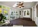 View of screened porch with seating and skylights that provide natural lighting to the area at 1412 Amberton Ct, Raleigh, NC 27615