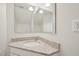 Well-lit bathroom featuring granite countertop, sink and modern mirror at 145 Richmond Park Dr, Cameron, NC 28326