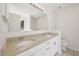 Spacious bathroom with double vanity featuring granite countertop and modern mirror at 145 Richmond Park Dr, Cameron, NC 28326