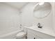 Freshly remodeled bathroom with white tiling and modern fixtures at 145 Richmond Park Dr, Cameron, NC 28326