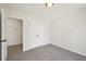 Bedroom with neutral carpet, closet, and a doorway leading to a connected space at 145 Richmond Park Dr, Cameron, NC 28326