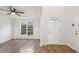 Bright room with hardwood floors, wainscoting trim, and large window at 145 Richmond Park Dr, Cameron, NC 28326