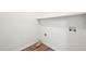 Bright, functional laundry room with essential connections and shelf at 145 Richmond Park Dr, Cameron, NC 28326