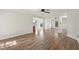 Bright living room features hardwood floors and neutral color palette at 145 Richmond Park Dr, Cameron, NC 28326