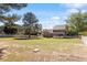 Expansive backyard featuring lush greenery, a privacy fence and large trees at 192 Crestdale Dr, Clayton, NC 27520