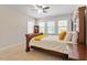 Comfortable bedroom with a queen bed, a nightstand, and plenty of natural light from the windows at 192 Crestdale Dr, Clayton, NC 27520