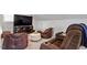 Bonus room features comfortable seating, TV, and a relaxing atmosphere, perfect for unwinding at 192 Crestdale Dr, Clayton, NC 27520