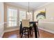Cozy breakfast nook with three windows and hardwood floors at 192 Crestdale Dr, Clayton, NC 27520