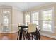 Eat-in kitchen area featuring natural light and hardwood floors at 192 Crestdale Dr, Clayton, NC 27520