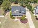 Charming two-story home with brick facade, landscaped yard, covered porch, and inviting curb appeal at 192 Crestdale Dr, Clayton, NC 27520