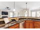 Well-appointed kitchen featuring a breakfast bar and granite countertops at 192 Crestdale Dr, Clayton, NC 27520