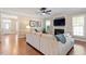 Spacious living room with hardwood floors, a fireplace, and an open layout at 192 Crestdale Dr, Clayton, NC 27520