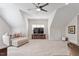 Expansive bonus room with a large TV, comfortable seating, and recessed lighting at 192 Crestdale Dr, Clayton, NC 27520