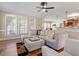 Comfortable living room showcasing hardwood floors and easy access to the kitchen area at 192 Crestdale Dr, Clayton, NC 27520