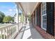 A long, covered porch offers ample space and shade, perfect for enjoying the outdoors at 192 Crestdale Dr, Clayton, NC 27520