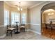 Casual dining area with hardwood floors, natural light and space to gather at 207 Reedhaven Dr, Cary, NC 27513
