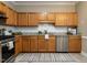 Well-equipped kitchen with stainless steel appliances and ample cabinet space at 207 Reedhaven Dr, Cary, NC 27513