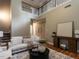 Living room with hardwood floors, fireplace, and comfortable seating at 207 Reedhaven Dr, Cary, NC 27513