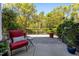 Private back yard featuring a stone patio and wrought iron fence at 212 Allister Dr, Raleigh, NC 27609