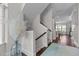 Open hallway with a staircase, wood floors, natural light, and an inviting atmosphere at 212 Allister Dr, Raleigh, NC 27609
