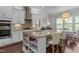 Modern kitchen with granite countertops, stainless steel appliances, and a functional island at 212 Allister Dr, Raleigh, NC 27609