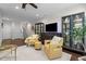 Inviting living room with hardwood floors, stylish decor, furniture, and great light at 212 Allister Dr, Raleigh, NC 27609