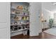 Well-organized pantry with shelving, providing ample space for food storage and small appliances at 212 Allister Dr, Raleigh, NC 27609
