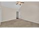 Bedroom features vaulted ceilings, ceiling fan, neutral paint and an ensuite bathroom at 215 Oxfordshire Dr, Fuquay Varina, NC 27526