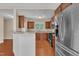 Well-lit kitchen with stainless steel appliances and modern countertops at 215 Oxfordshire Dr, Fuquay Varina, NC 27526