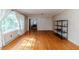 Bright and spacious living room featuring hardwood floors and neutral decor at 2307 Piedmont Dr, Sanford, NC 27330