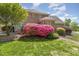 Beautiful backyard with mature landscaping, patio area, and well-maintained lawn at 2545 Churchill Dr, Burlington, NC 27215