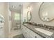 Bathroom with dual sinks, granite countertop, and white cabinets provides great storage at 2545 Churchill Dr, Burlington, NC 27215