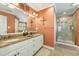 Bathroom boasts dual sinks, granite countertops, walk-in shower, and designer finishes at 2545 Churchill Dr, Burlington, NC 27215