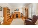 Charming office space with a roll-top desk, hardwood floors, and natural light at 2545 Churchill Dr, Burlington, NC 27215