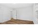 Bright bedroom with wood-look flooring and natural light at 2605 Joe Pruitt Rd, Oxford, NC 27565