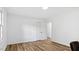 Spacious bedroom with closet and wood-look flooring at 2605 Joe Pruitt Rd, Oxford, NC 27565