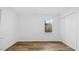 Bright bedroom with wood-look flooring, closet, and natural light at 2605 Joe Pruitt Rd, Oxford, NC 27565