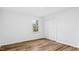 Bright bedroom featuring wood-look flooring, natural light and closet at 2605 Joe Pruitt Rd, Oxford, NC 27565