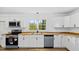Modern kitchen featuring wood counters, stainless steel appliances, and ample lighting at 2605 Joe Pruitt Rd, Oxford, NC 27565