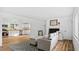 Bright and modern living room seamlessly connects to a renovated kitchen, great for entertaining at 2605 Joe Pruitt Rd, Oxford, NC 27565