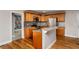 Well-equipped kitchen with stainless steel appliances, granite countertops, and wood cabinetry at 305 Freeman St, Raleigh, NC 27601